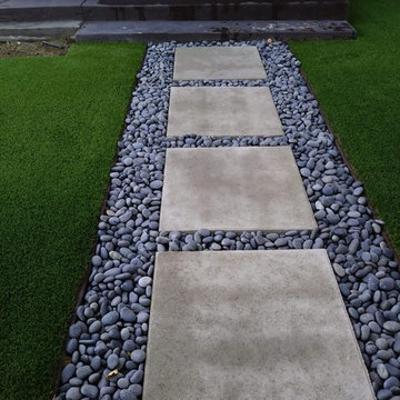 Small Backyard Renovation with Artificial Grass, Pavers, and Concrete