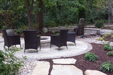 Design ideas for a small backyard brick landscaping in Other.