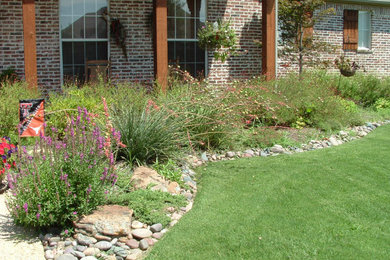 This is an example of a traditional river rock lawn edging in Dallas.