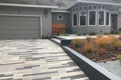 Design ideas for a contemporary front yard brick landscaping in San Francisco.