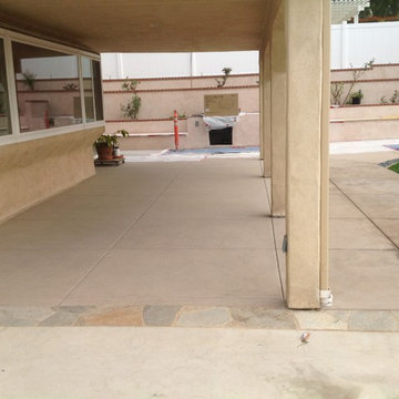 Solid patio cover & new concrete patio / flagstone design