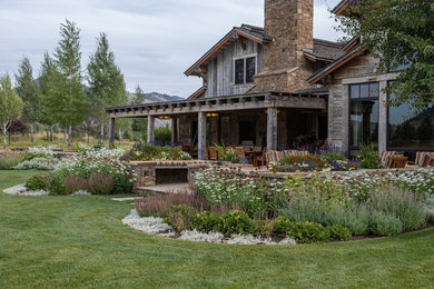 This is an example of a rustic backyard landscaping in Other.