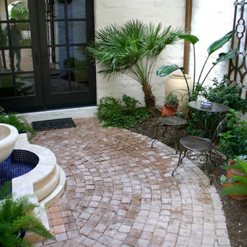 Spanish style courtyard with wall fountain