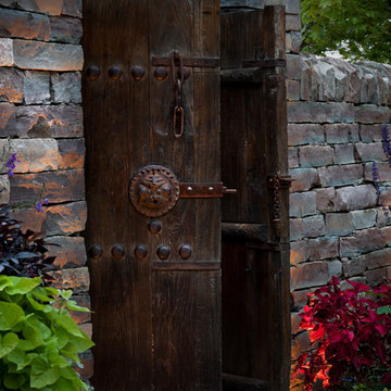 Stacked Stone Wall and Antique Wood Door