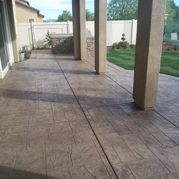 Stamped Concrete, Custom BBQ Island, Sod Stepping Stones and Landscape