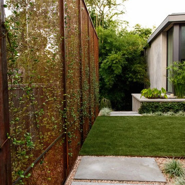 Steel Privacy Walls Create Outdoor Room