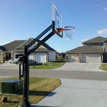 Steve W's Pro Dunk Gold Basketball System on a 48x44 in West Fargo, ND