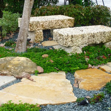 Stone benches tropical garden