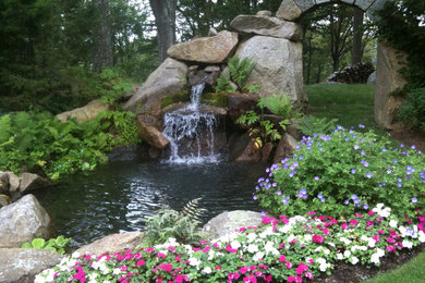 This is an example of a mid-sized coastal formal garden in Boston.