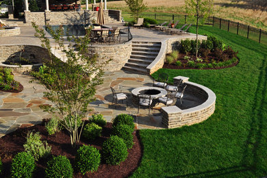 Stone firepit and flagstone patio
