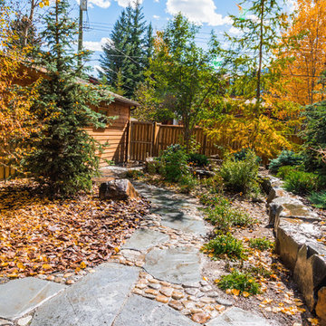 Stone Pathway with Rock Retaining Wall Garden