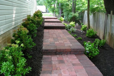 This is an example of a side yard brick garden path in DC Metro.