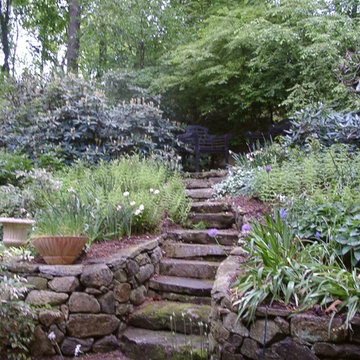 Stone staircase leads to secluded sitting area