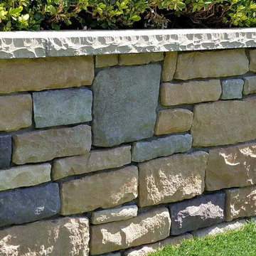 Stone Veneer Retaining Wall with Cap