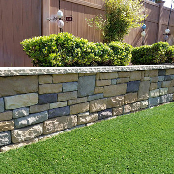 Stone Veneer Wall and Cap with Artificial Grass