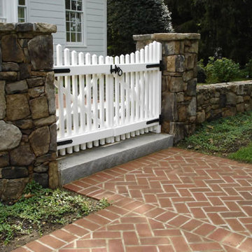 Stone Wall and White Picket Gate