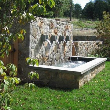 Stone water feature with 4 stone water Runnels