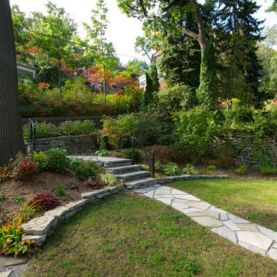 Photo of a traditional backyard stone landscaping in Toronto.