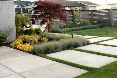 Design ideas for a mid-sized contemporary full sun front yard concrete paver landscaping in Seattle.