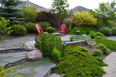 Inspiration for a mid-sized modern landscaping in Edmonton.