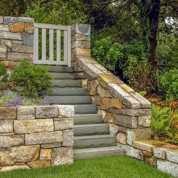 Sustainable Landscape Design with Granite Retaining wall and Bluestone Steps