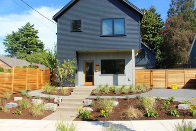 Inspiration for a mid-sized modern drought-tolerant and full sun front yard concrete paver garden path in Portland.