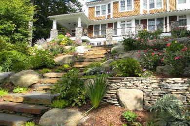 Design ideas for a large rustic sloped full sun garden in Bridgeport with a garden path and natural stone paving.