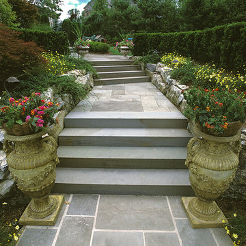 Terrraced blue stone walkway with landscaped border