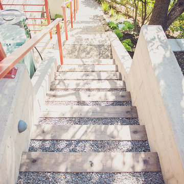 Timber + Gravel Stairs with Board-formed Concrete Cheek Walls