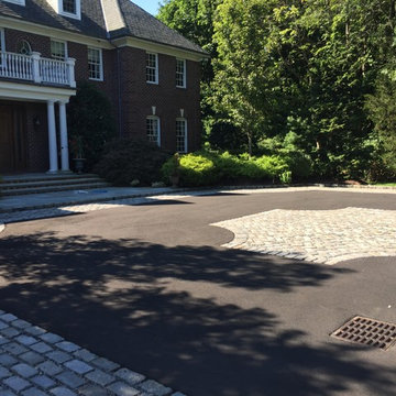 Traditional Brick Poolside Patio and Driveway