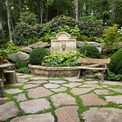 This is an example of a traditional shade backyard stone landscaping in Atlanta.