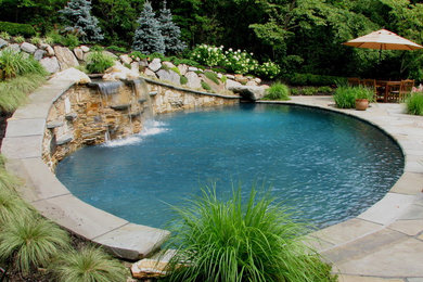 Example of an arts and crafts pool design in New York