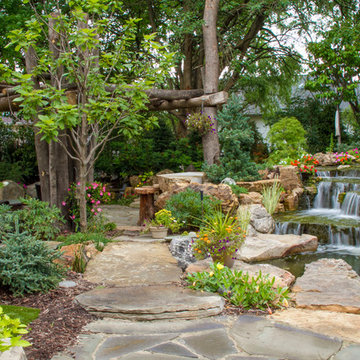 Tree and Waterfall Inspired Backyard