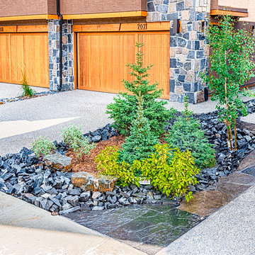 Trees & Shrubs Surrounded by Rundle Stone Tailings & Flagstone
