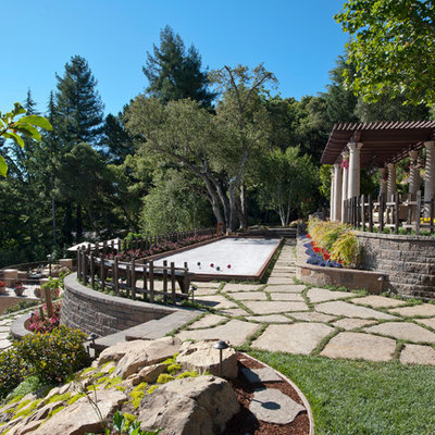 Design ideas for a mediterranean hillside stone landscaping in San Francisco.