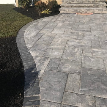 Unilock patio,fire-pit,plantings,sod