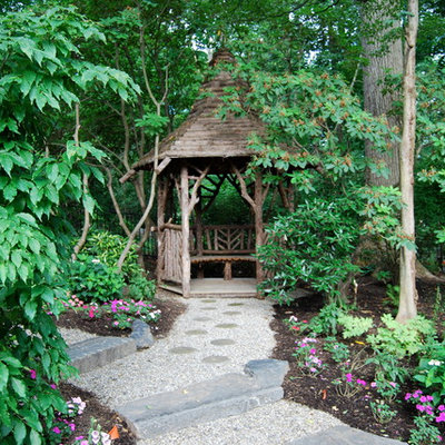 This is an example of a rustic shade backyard landscaping in Philadelphia.