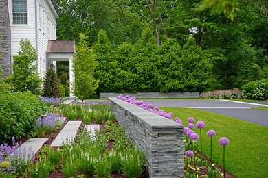 Inspiration for a large contemporary full sun front yard landscaping in New York.