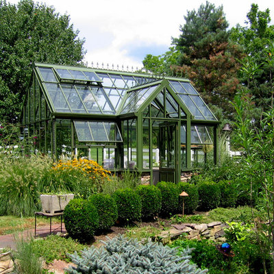 Inspiration for a traditional full sun backyard stone landscaping in Philadelphia.