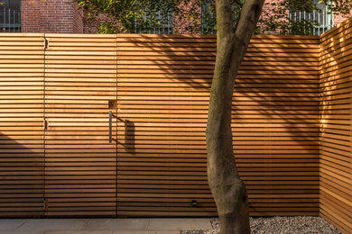 Photo of a contemporary backyard landscaping in Boston.