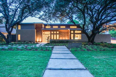 Design ideas for a modern concrete paver garden path in Dallas.