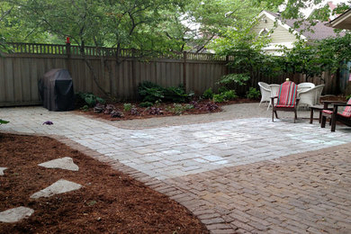 Design ideas for a small traditional back fully shaded garden in Chicago with a garden path and natural stone paving.