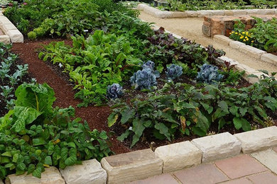 Inspiration for a mid-sized traditional partial sun backyard mulch vegetable garden landscape in Denver for spring.