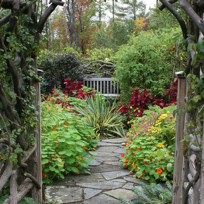 This is an example of a traditional backyard stone garden path in New York.