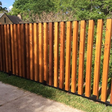 Vertical Wood Fence with Metal Frame