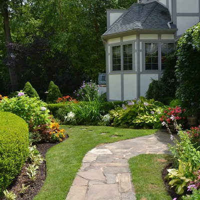 Photo of a traditional backyard landscaping in New York.