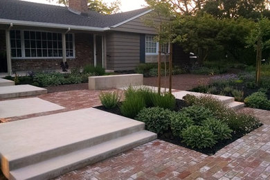 This is an example of a large contemporary full sun backyard brick landscaping in San Francisco.
