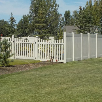 Vinyl privacy and open-top picket fence in tan.