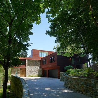 Design ideas for a huge contemporary shade front yard concrete paver driveway in DC Metro.
