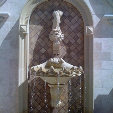 Wall Fountain with marble tile inset.
